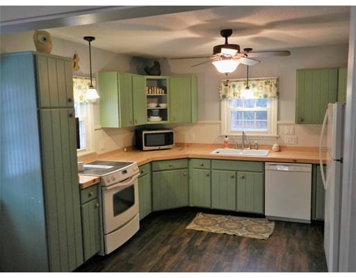 1291 Plumtree Road Springfield, MA 01119 - Photo 2 of 30 a kitchen with granite countertop a sink and refrigerator