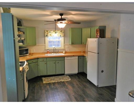 1291 Plumtree Road Springfield, MA 01119 - Photo 3 of 30 a kitchen with a refrigerator and a sink