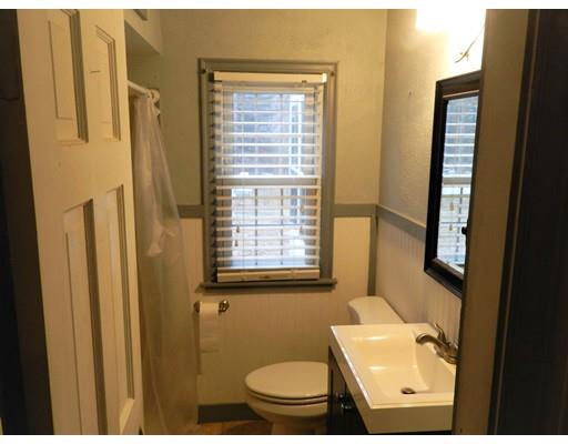 1291 Plumtree Road Springfield, MA 01119 - Photo 9 of 30 a bathroom with a toilet a sink and a shower