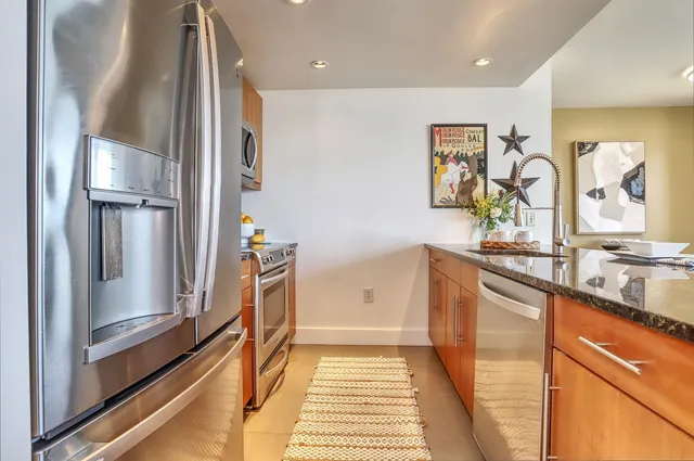 a hallway with cabinets