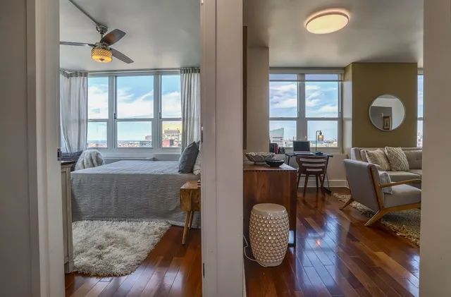a living room with furniture and a window