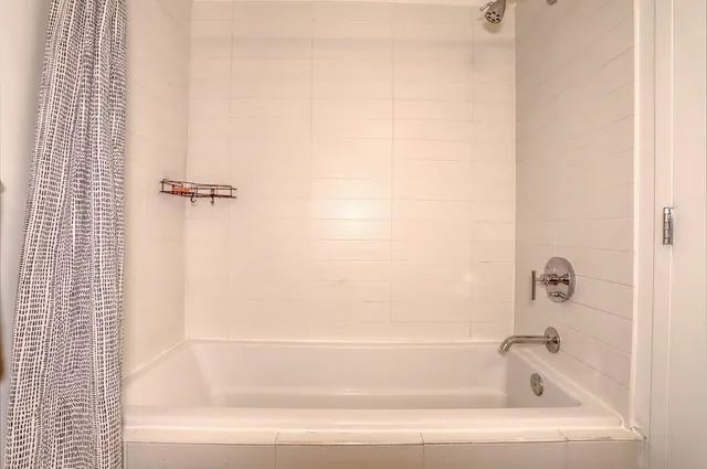 a bathroom with a bathtub