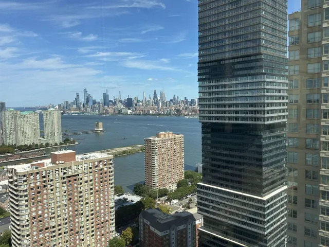 a view of a balcony with a bench