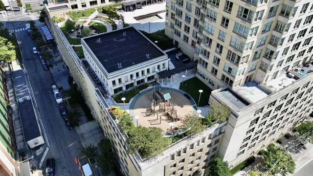 a view of a backyard with sitting area