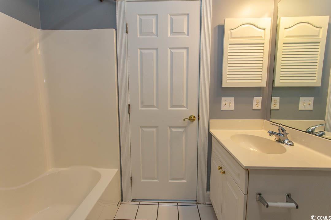 4823 Orchid Way, Unit 2203 Myrtle Beach, SC 29577 - Photo 17 of 36 Full bath featuring tile patterned floors and vanity
