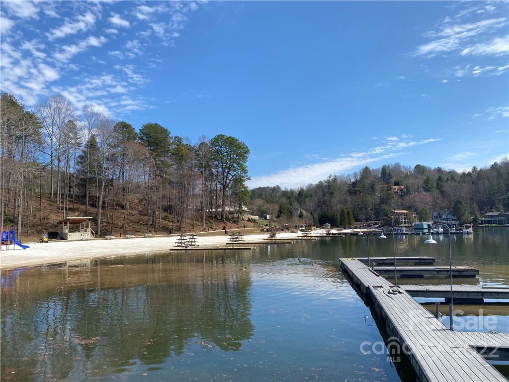 Tbd Rumbling Bald Road Lake Lure, NC 28746 - Photo 7 of 14 a view of river covered by trees and buildings