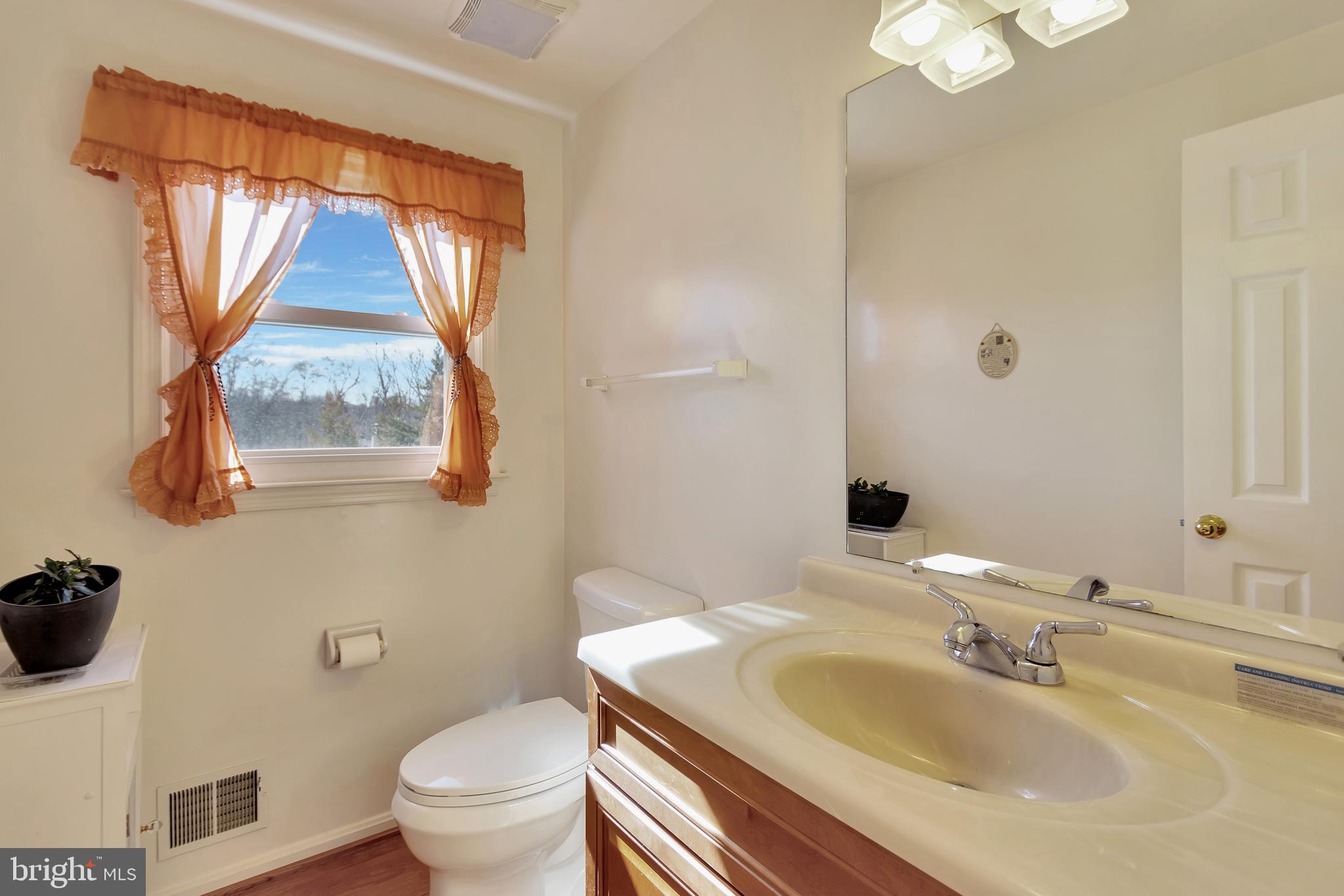 2228 Deckman Lane Silver Spring, MD 20906 - Photo 12 of 39 Powder room on main level