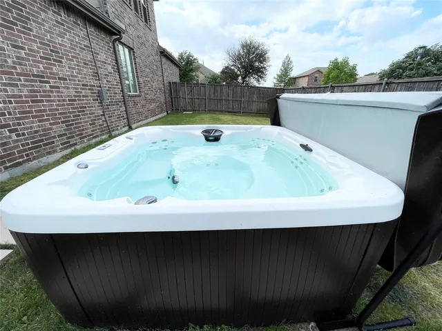 a view of roof deck with furniture