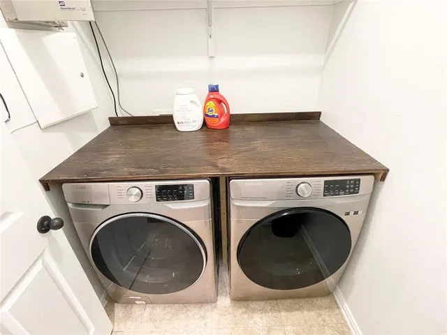 a view of a living room with furniture