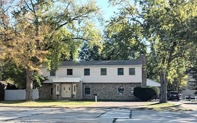 1323 South Roselle Road Schaumburg, IL 60193 - Photo 1 of 51 a view of a house with a swimming pool