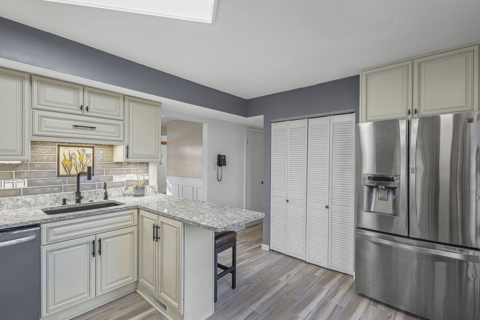 1323 South Roselle Road Schaumburg, IL 60193 - Photo 14 of 51 a kitchen with a refrigerator and a sink