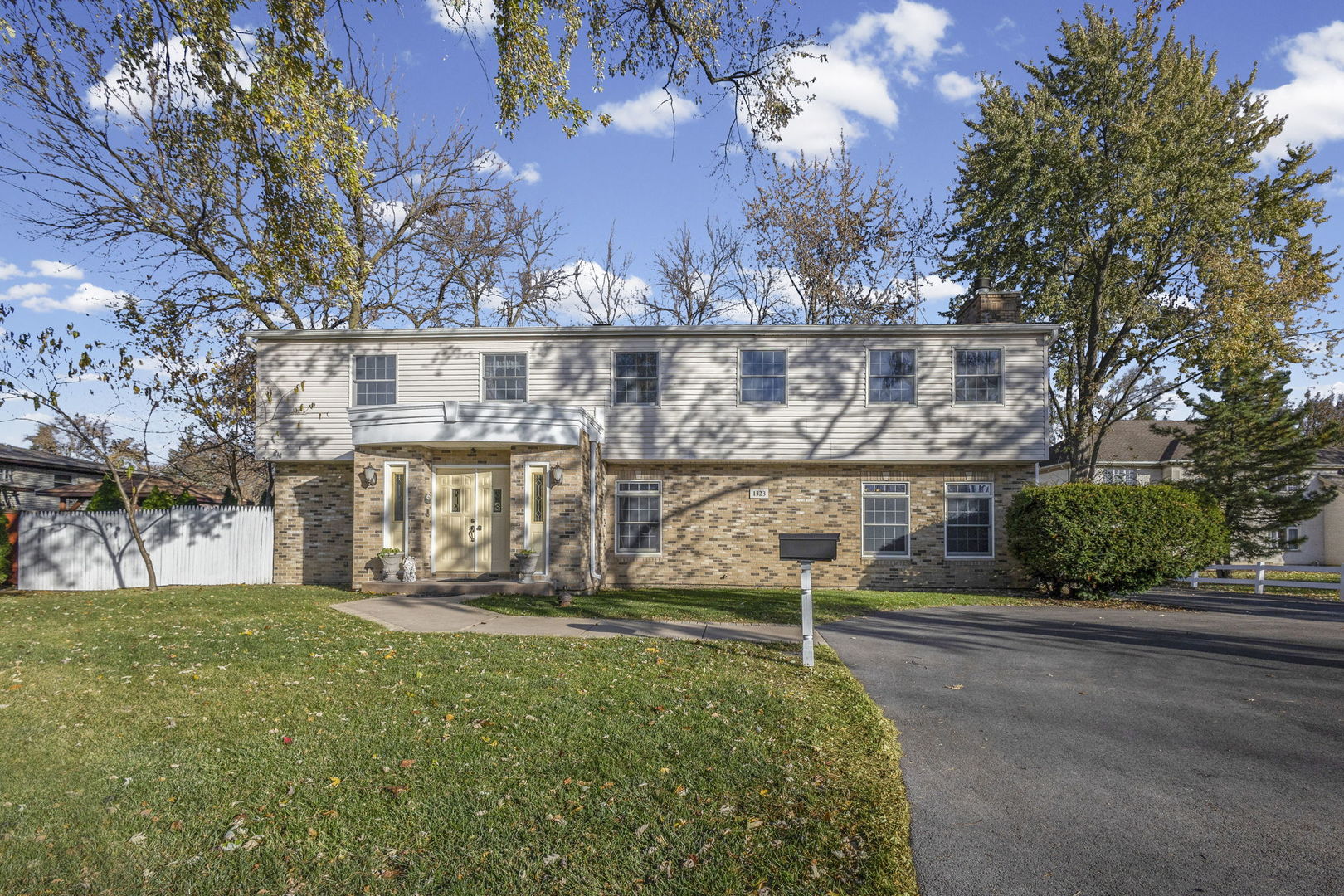 1323 South Roselle Road Schaumburg, IL 60193 - Photo 2 of 51 a view of a house with a yard