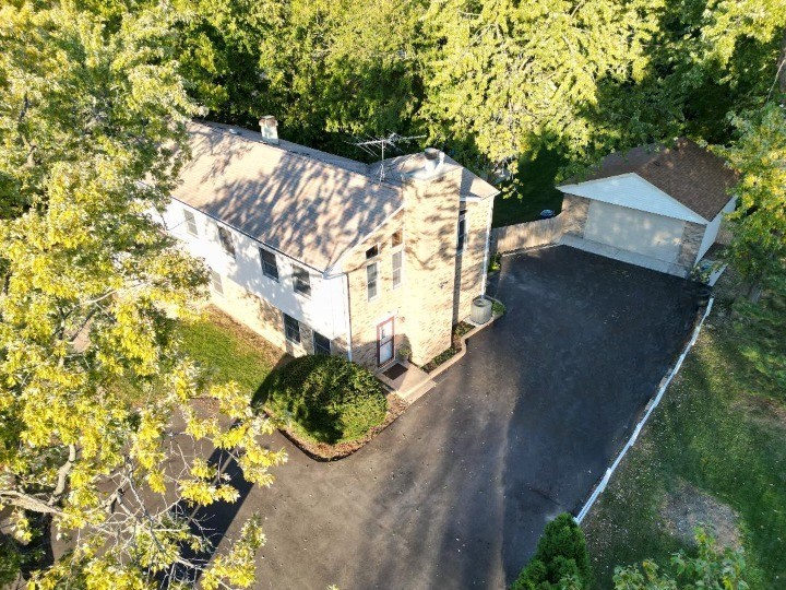 1323 South Roselle Road Schaumburg, IL 60193 - Photo 4 of 51 a view of a house with a yard