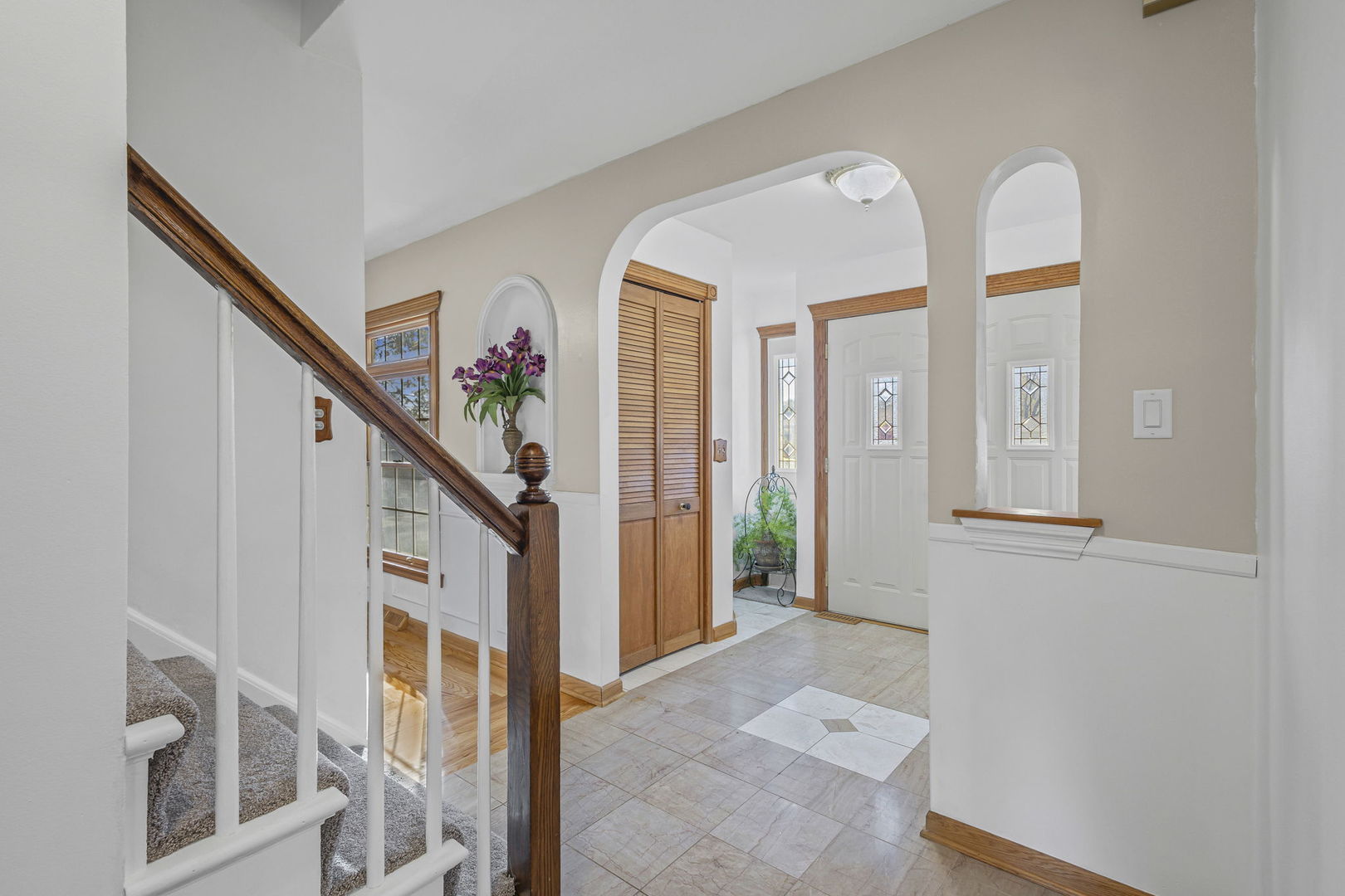 1323 South Roselle Road Schaumburg, IL 60193 - Photo 5 of 51 a very nice looking room with many windows and walls