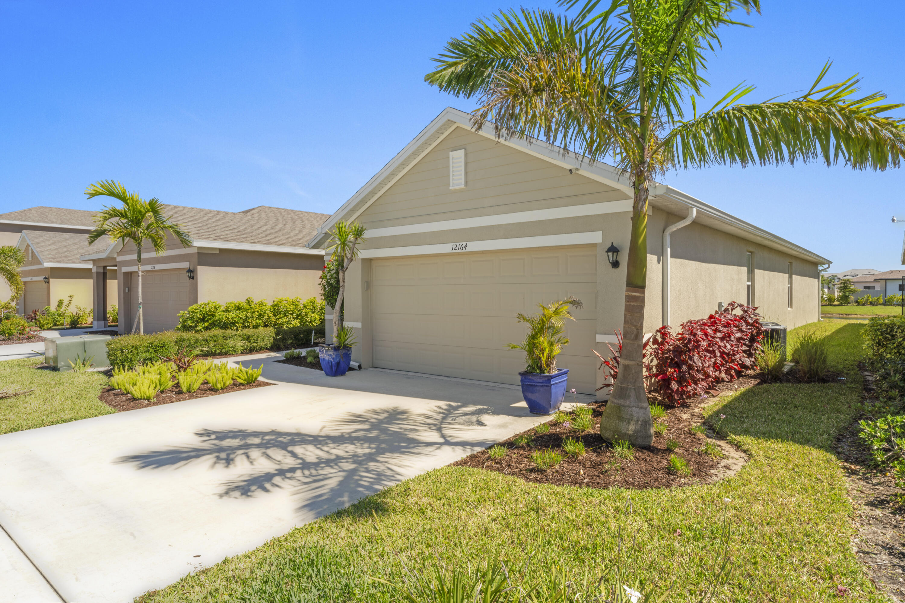 12164 Rimini Way Port St. Lucie, FL 34987 - Photo 28 of 55 Front Side House
