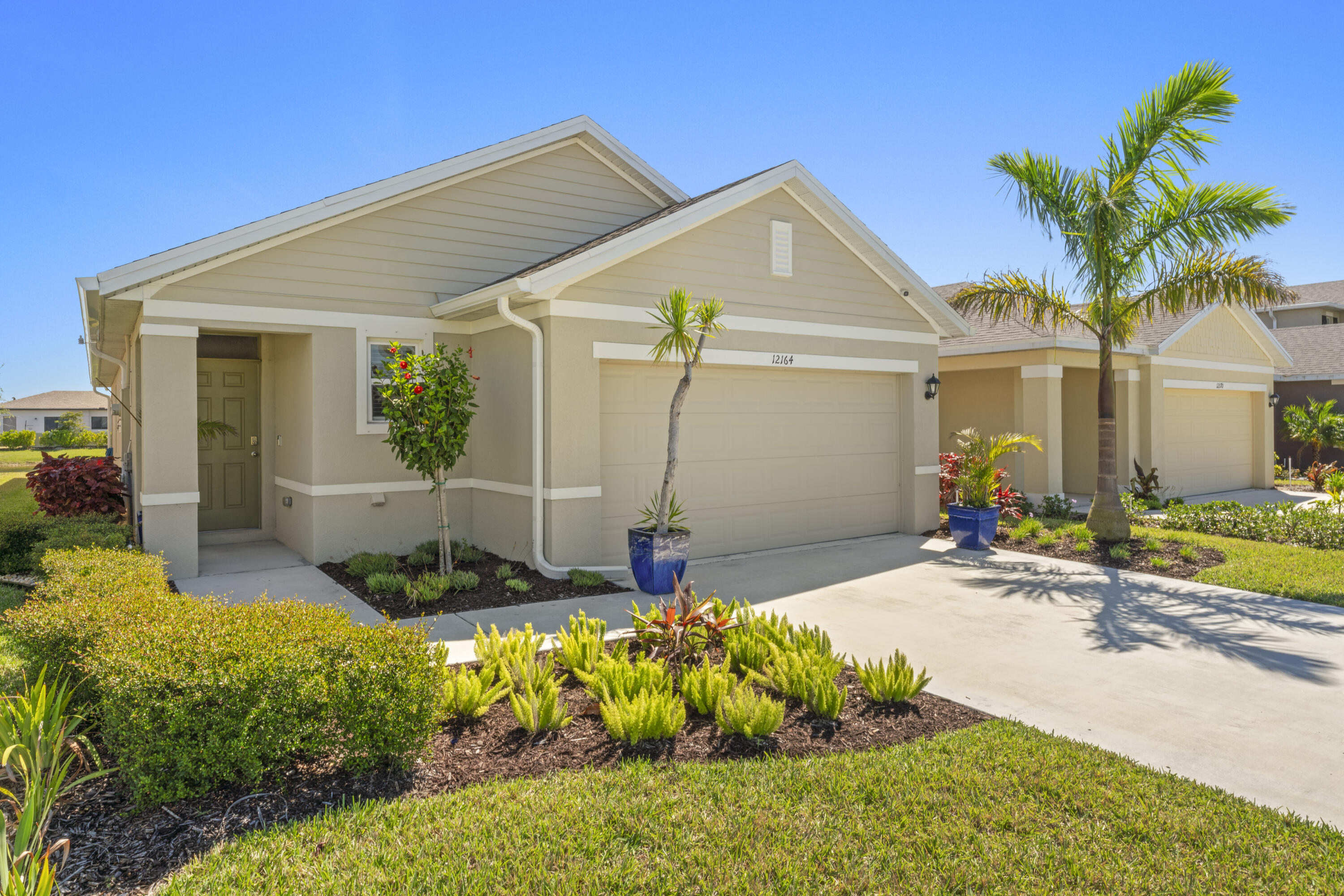 12164 Rimini Way Port St. Lucie, FL 34987 - Photo 29 of 55 Front Side House
