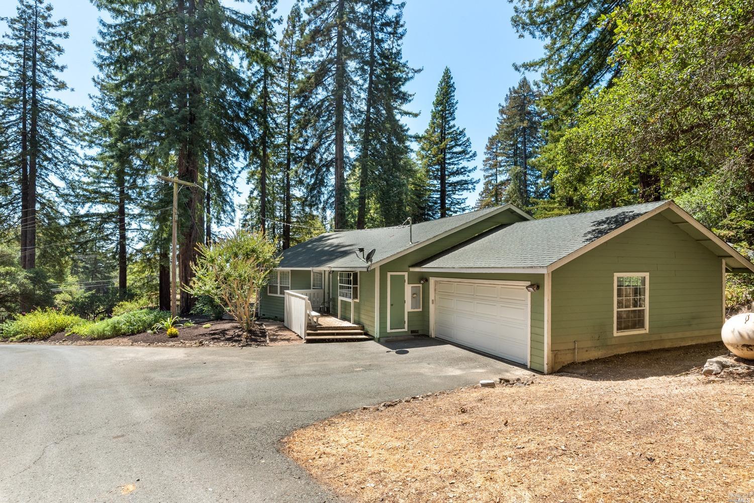 13220 Occidental Road Sebastopol, CA 95472 - Photo 1 of 1 a view of a house with a yard covered in snow