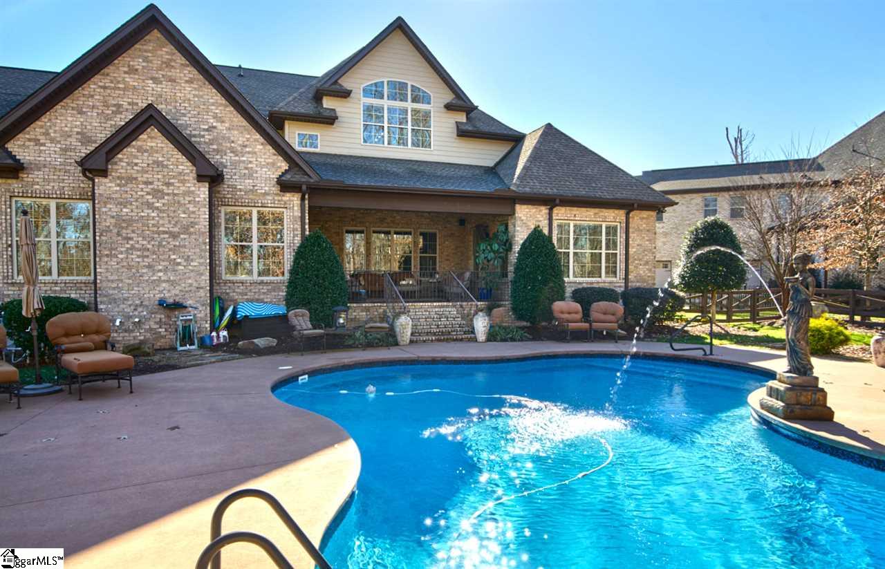 211 New Castle Drive Duncan, SC 29334 - Photo 27 of 36 Full Brick and great roof lines. Nice decking all around the pool for several different conversational areas. Plus great lighting day or night. Speakers outside in pool area as well.