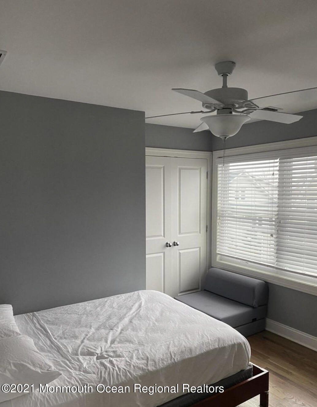 17 Via Ripa Way Sea Bright, NJ 07760 - Photo 15 of 33 a bedroom with a bed and a window