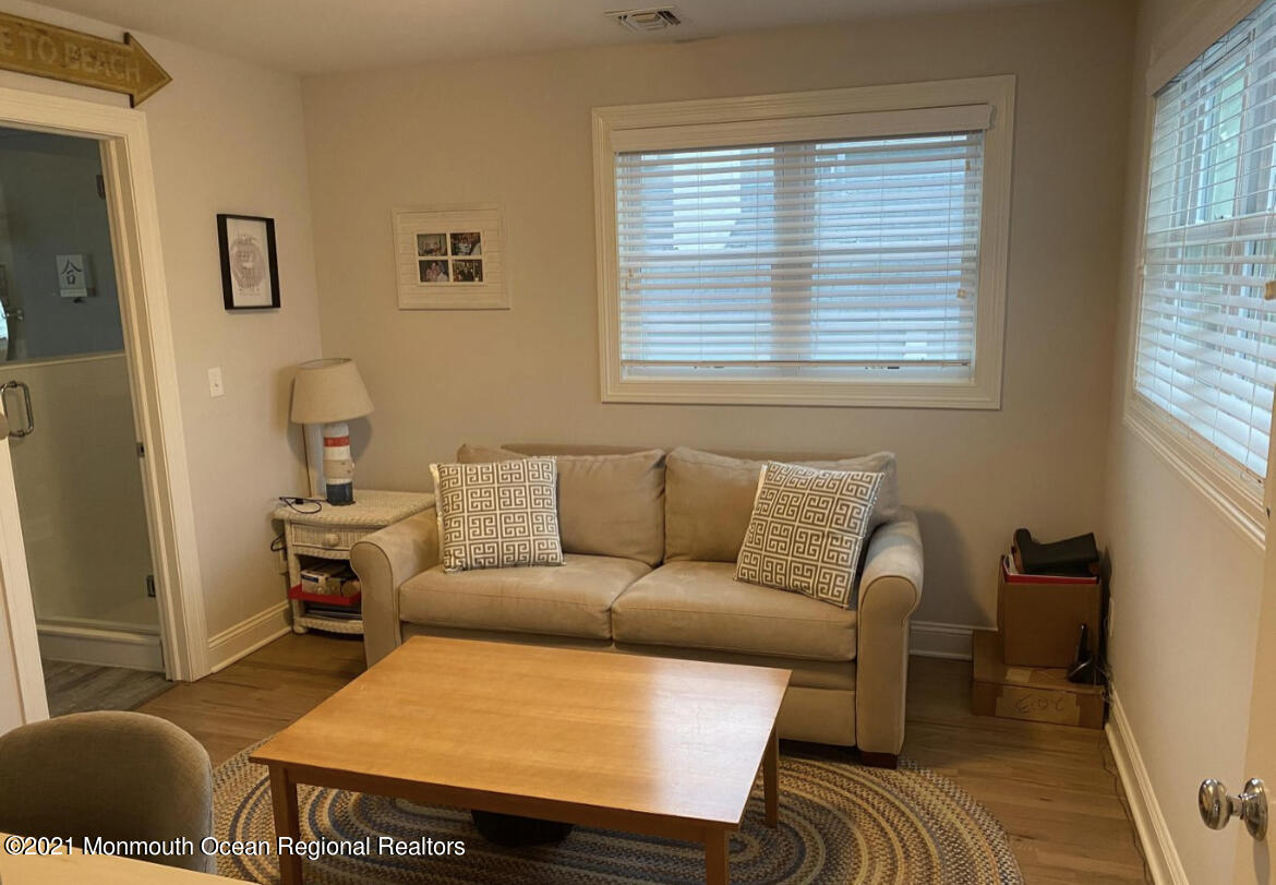 17 Via Ripa Way Sea Bright, NJ 07760 - Photo 16 of 33 a living room with furniture and a window