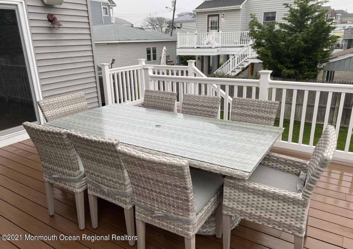 17 Via Ripa Way Sea Bright, NJ 07760 - Photo 21 of 33 a view of a house with a wooden deck