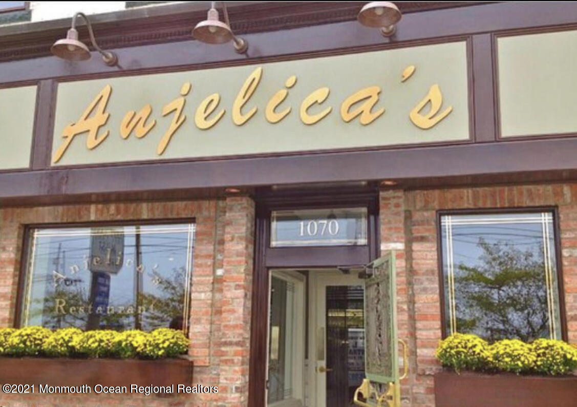 17 Via Ripa Way Sea Bright, NJ 07760 - Photo 27 of 33 a sign that is on the side of a building