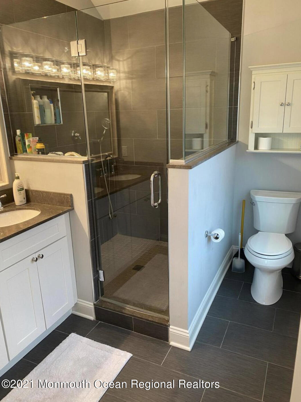 17 Via Ripa Way Sea Bright, NJ 07760 - Photo 8 of 33 a bathroom with a toilet and a shower