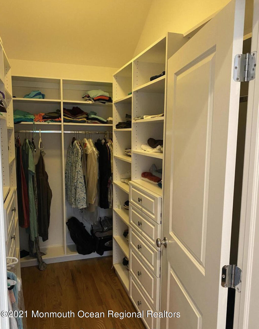 17 Via Ripa Way Sea Bright, NJ 07760 - Photo 9 of 33 a view of walk in closet with clothes and shoes