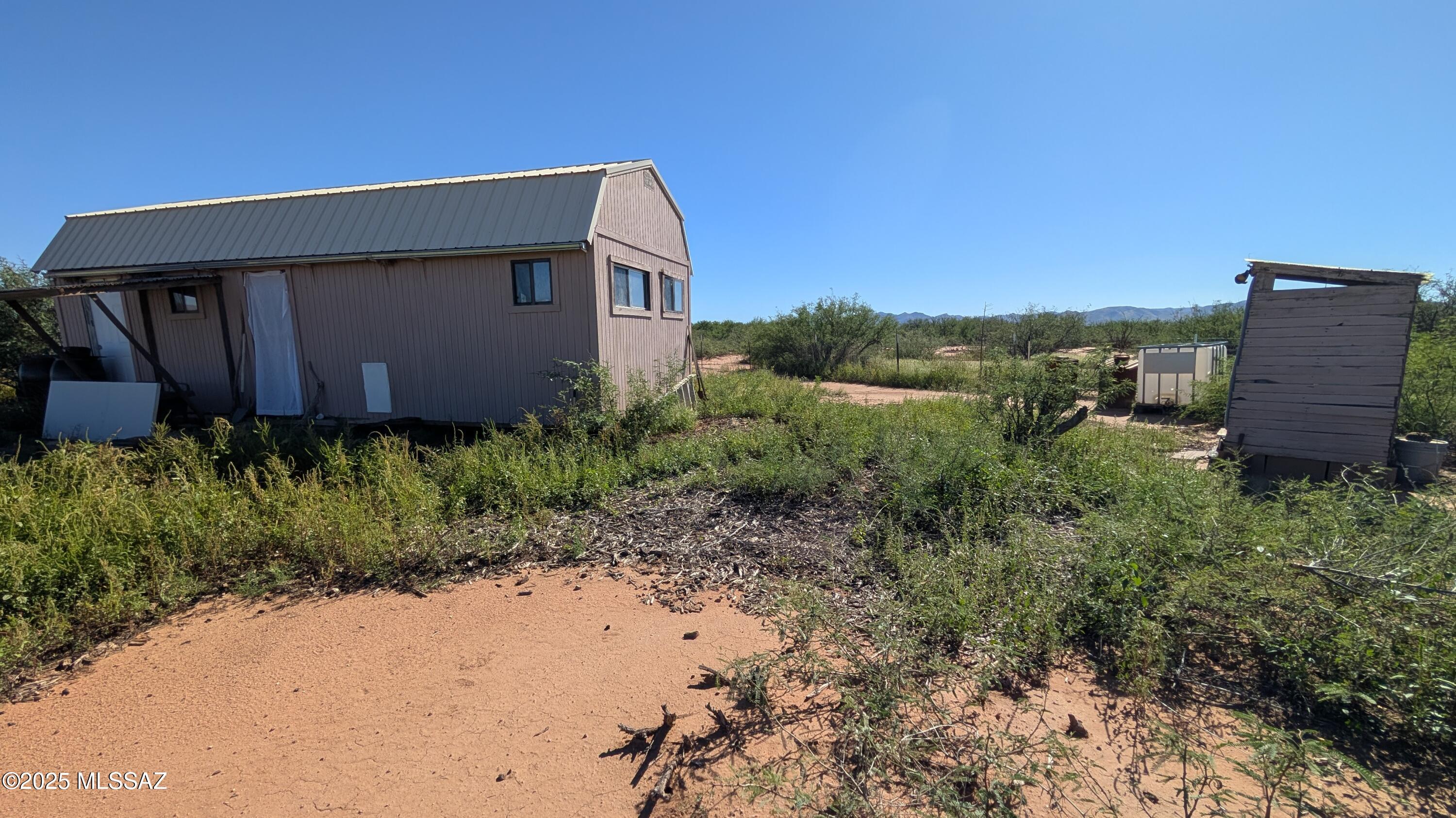Tbd North Westward Trail, Unit 9 McNeal, AZ 85617 - Photo 22 of 37 a house view with a backyard space