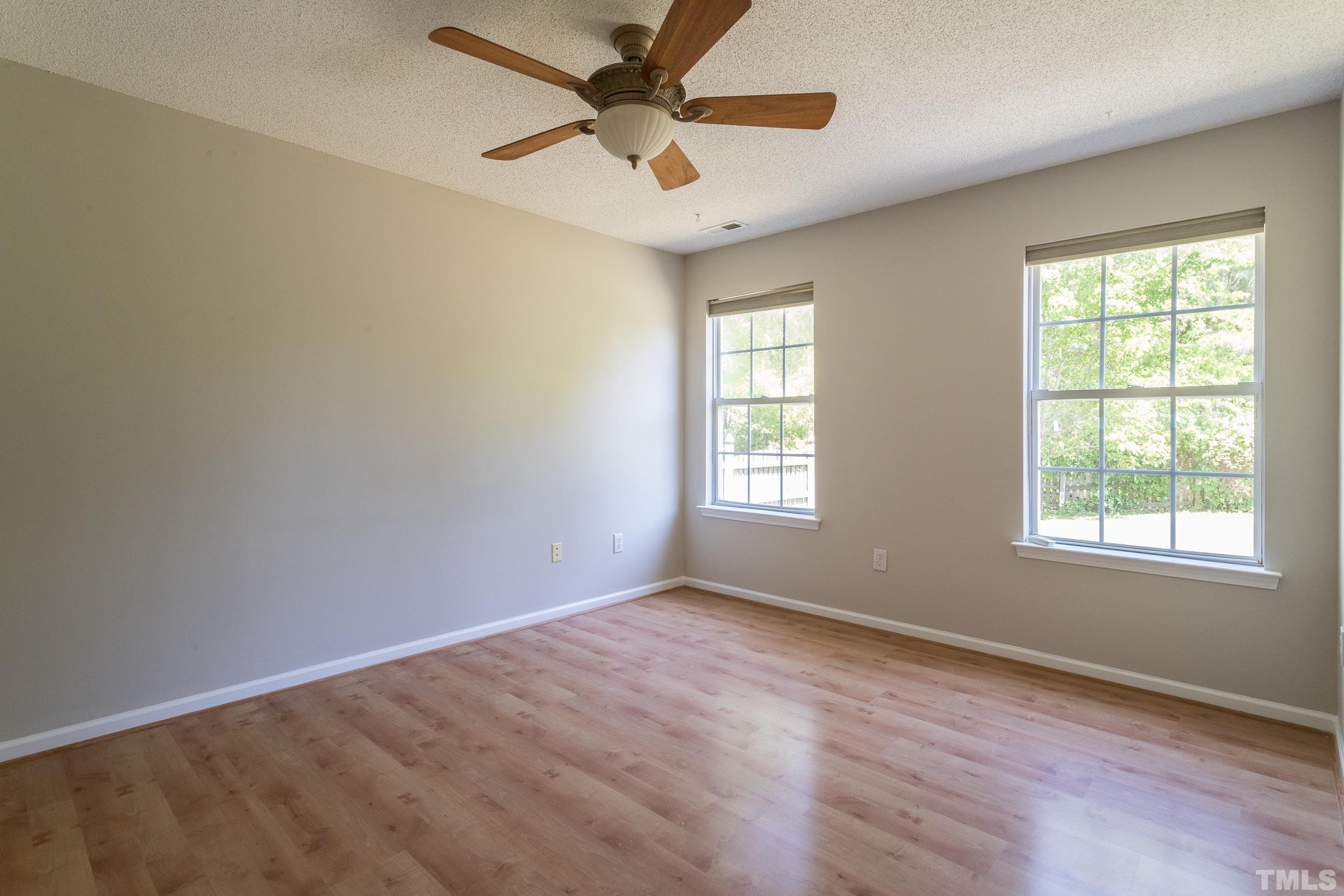 4411 Nightfall Court Durham, NC 27713 - Photo 16 of 28 wooden floor in an empty room with a window