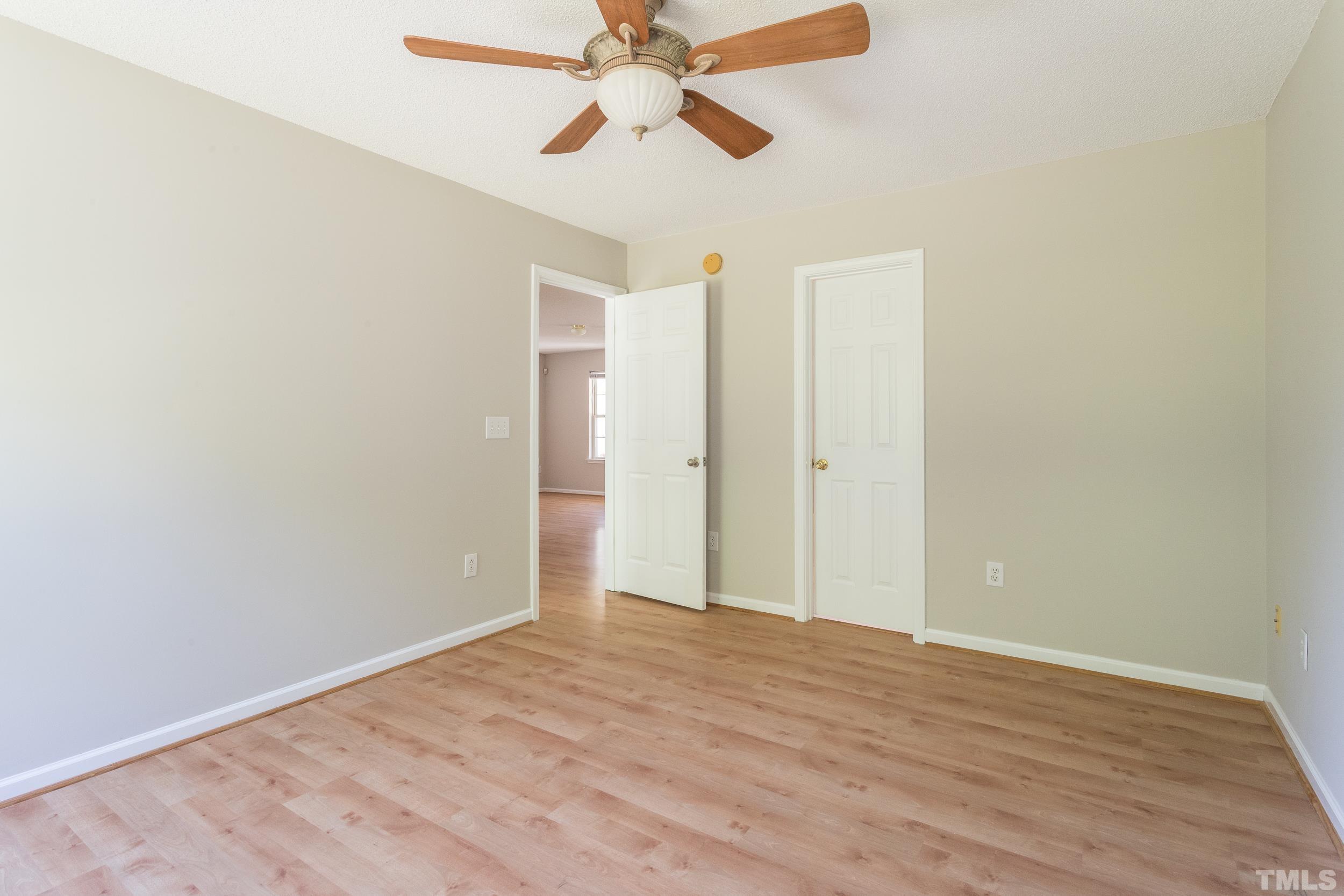 4411 Nightfall Court Durham, NC 27713 - Photo 10 of 28 a view of empty room with wooden floor