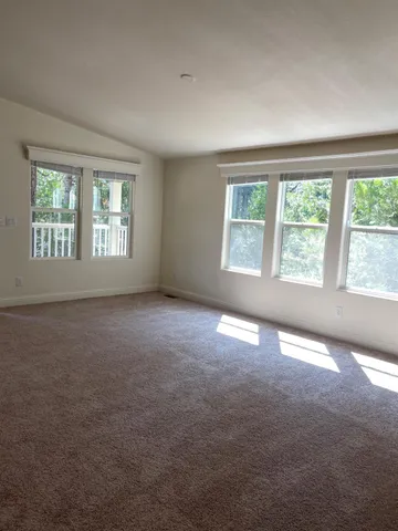 an open kitchen with a sink and dish washer