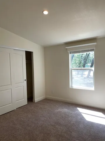 an empty room with windows