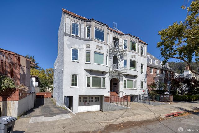 a front view of a building with street view