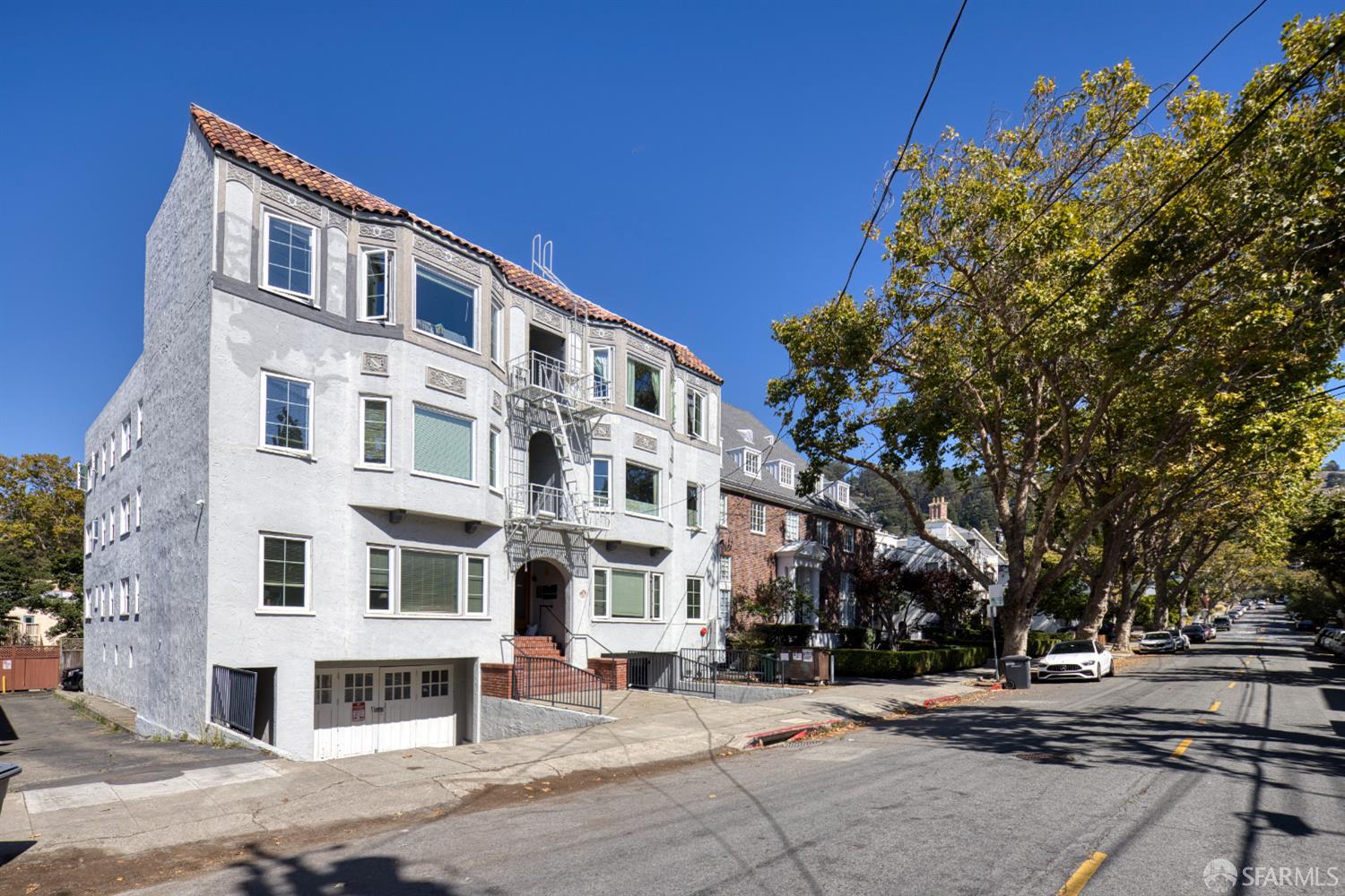 2451 Le Conte Avenue Berkeley, CA 94709 - Photo 12 of 36 a front view of a building with a yard