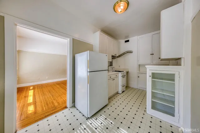 a bed room with furniture and a chandelier