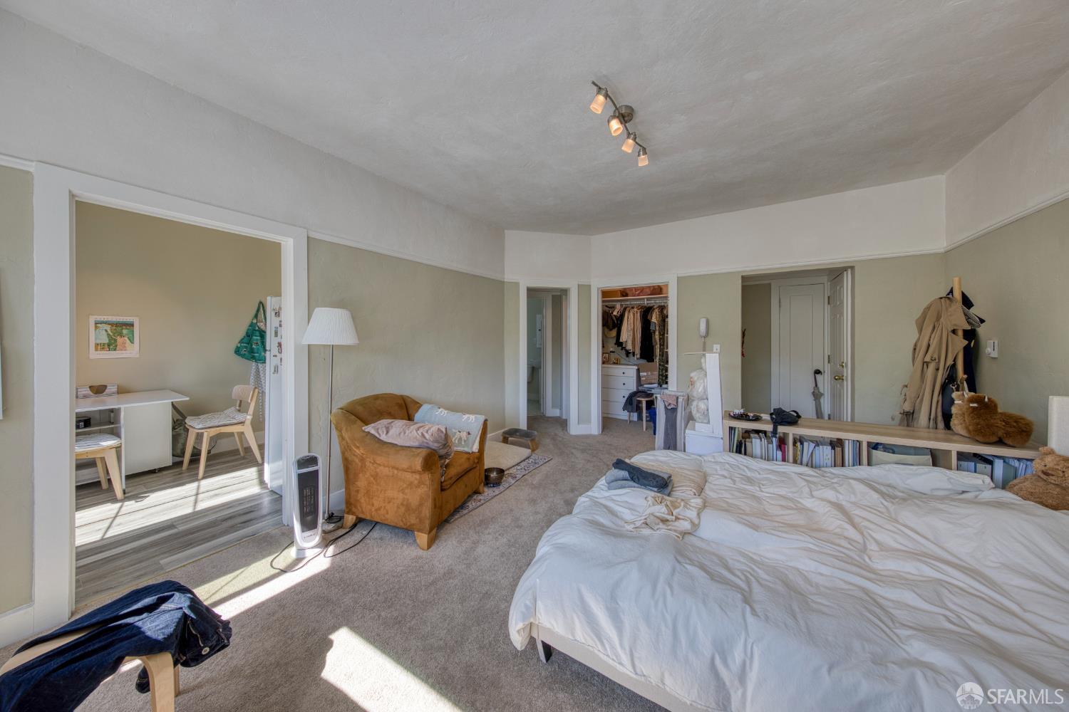 2451 Le Conte Avenue Berkeley, CA 94709 - Photo 27 of 36 a bedroom with furniture and a mirror
