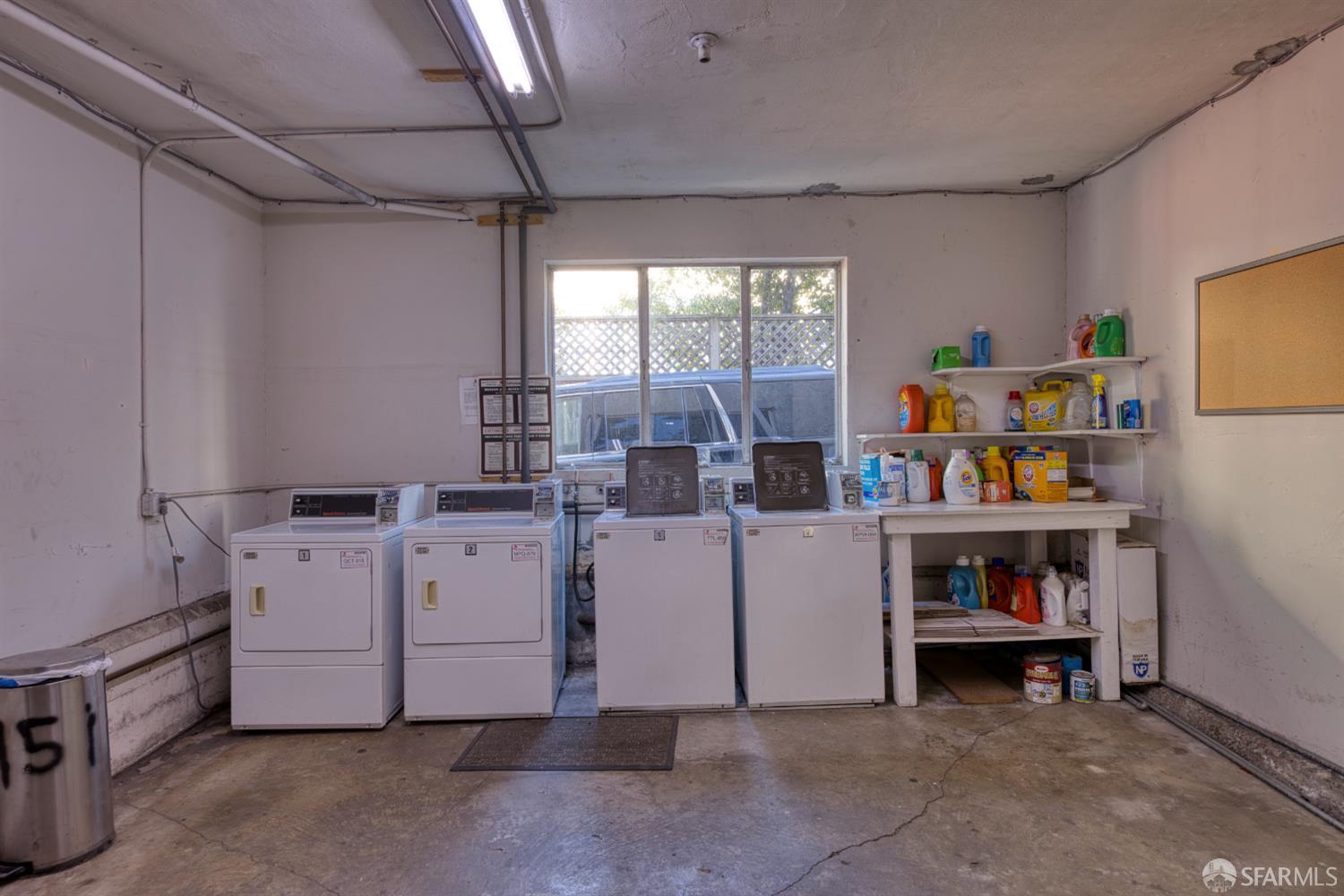 2451 Le Conte Avenue Berkeley, CA 94709 - Photo 36 of 36 a utility room with dryer and washer