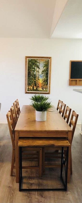 106 Coconut Road Surfside Beach, TX 77541 - Photo 14 of 25 a room with a table and a painting on the wall