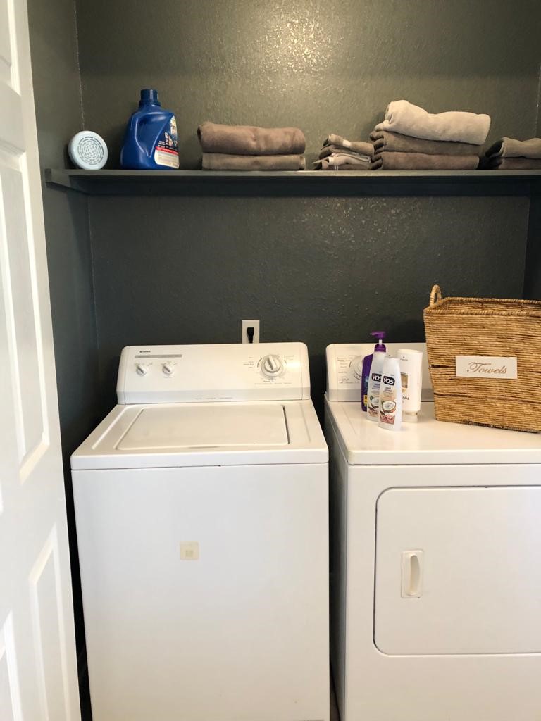 106 Coconut Road Surfside Beach, TX 77541 - Photo 20 of 25 a utility room with dryer and washer