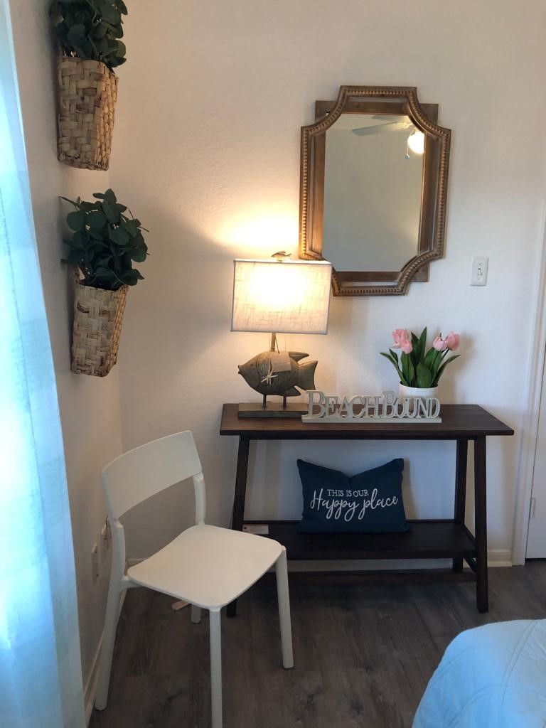106 Coconut Road Surfside Beach, TX 77541 - Photo 21 of 25 a view of bathroom with a sink and a mirror