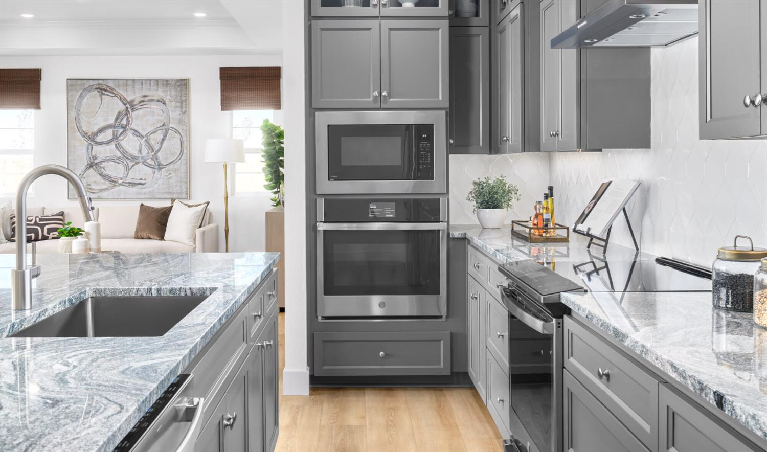 12433 Columba Way Rancho Cordova, CA 95742 - Photo 7 of 17 a kitchen with stainless steel appliances granite countertop a sink and a stove