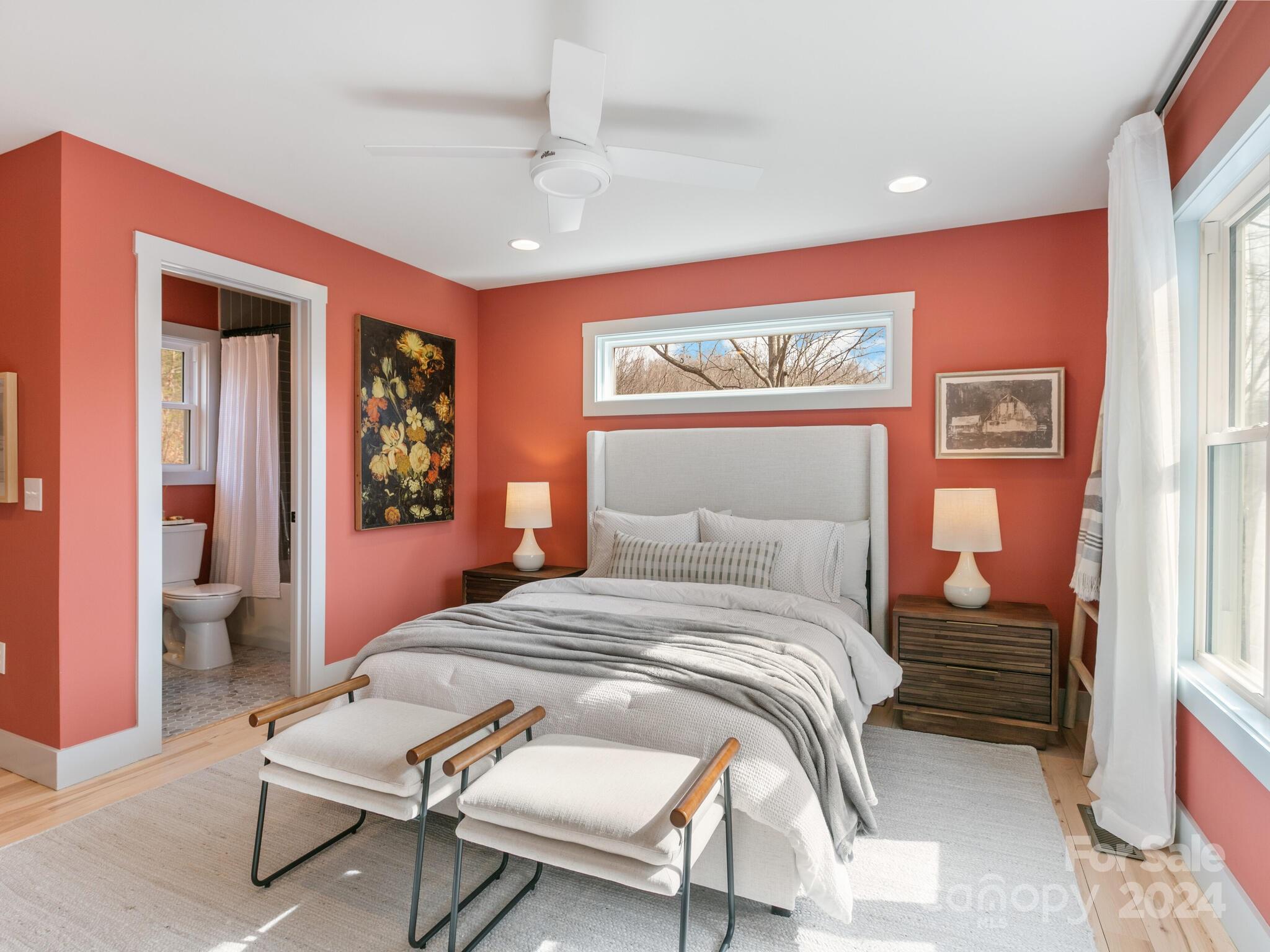 315 Porters Ridge Canton, NC 28716 - Photo 13 of 26 a bedroom with a bed and a chandelier