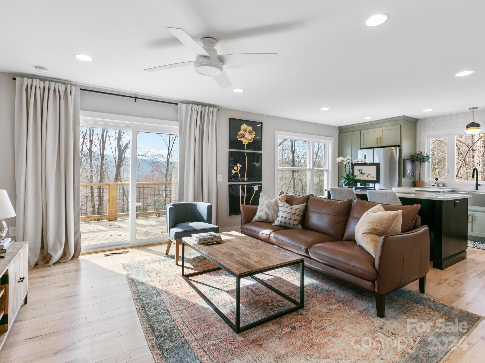 315 Porters Ridge Canton, NC 28716 - Photo 7 of 26 a living room with furniture and a large window