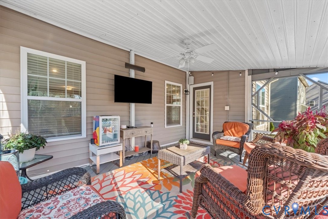 9119 Clearbrook Court Chesterfield, VA 23832 - Photo 23 of 50 a outdoor living space with furniture and a flat screen tv