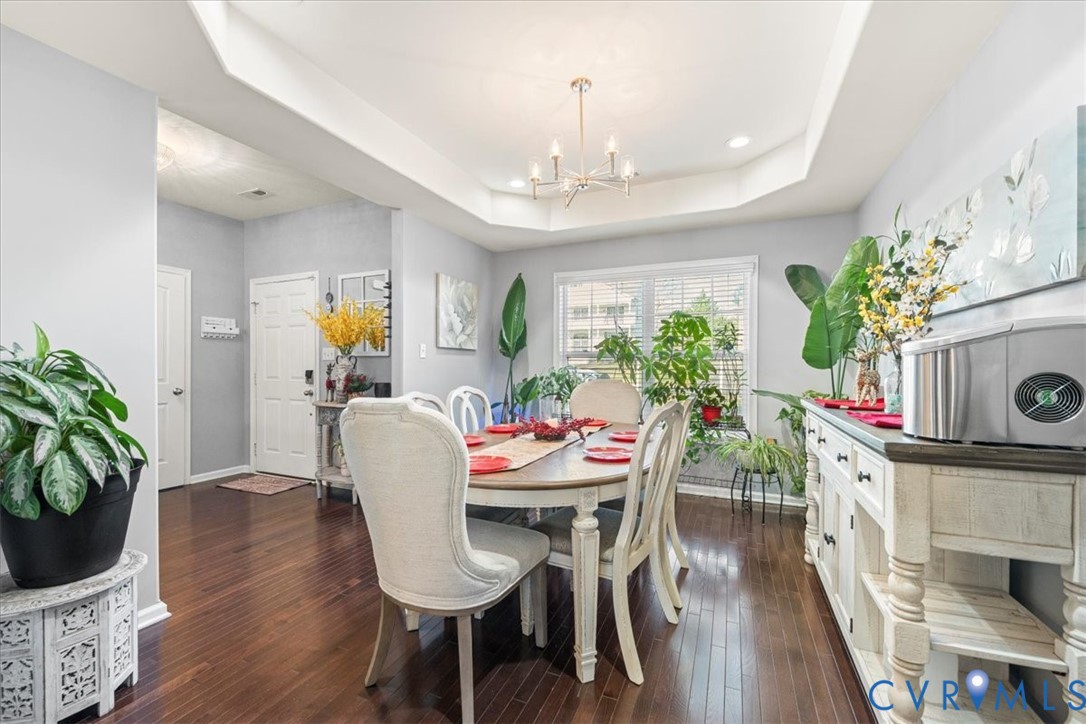 9119 Clearbrook Court Chesterfield, VA 23832 - Photo 6 of 50 Dining space with a raised ceiling, dark wood-styl