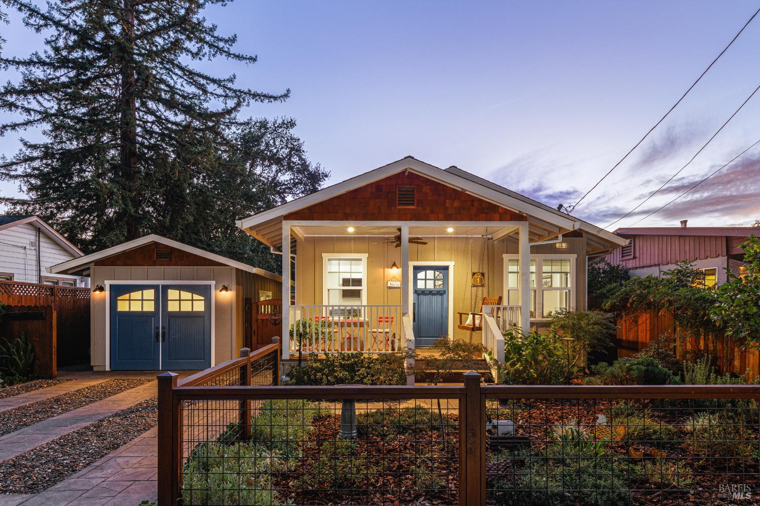18070 Riverside Drive Sonoma, CA 95476 - Photo 1 of 1 a front view of a house with garden