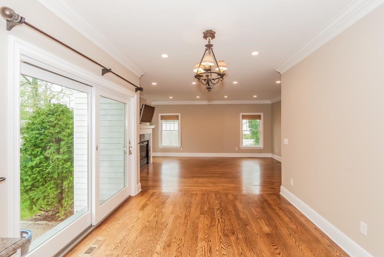 44 Gower Road New Canaan, CT 06840 - Photo 24 of 53 a view of an empty room with wooden floor and a window