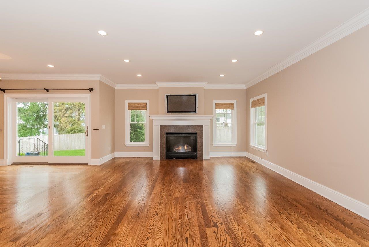 44 Gower Road New Canaan, CT 06840 - Photo 26 of 53 a view of an empty room with wooden floor and a window