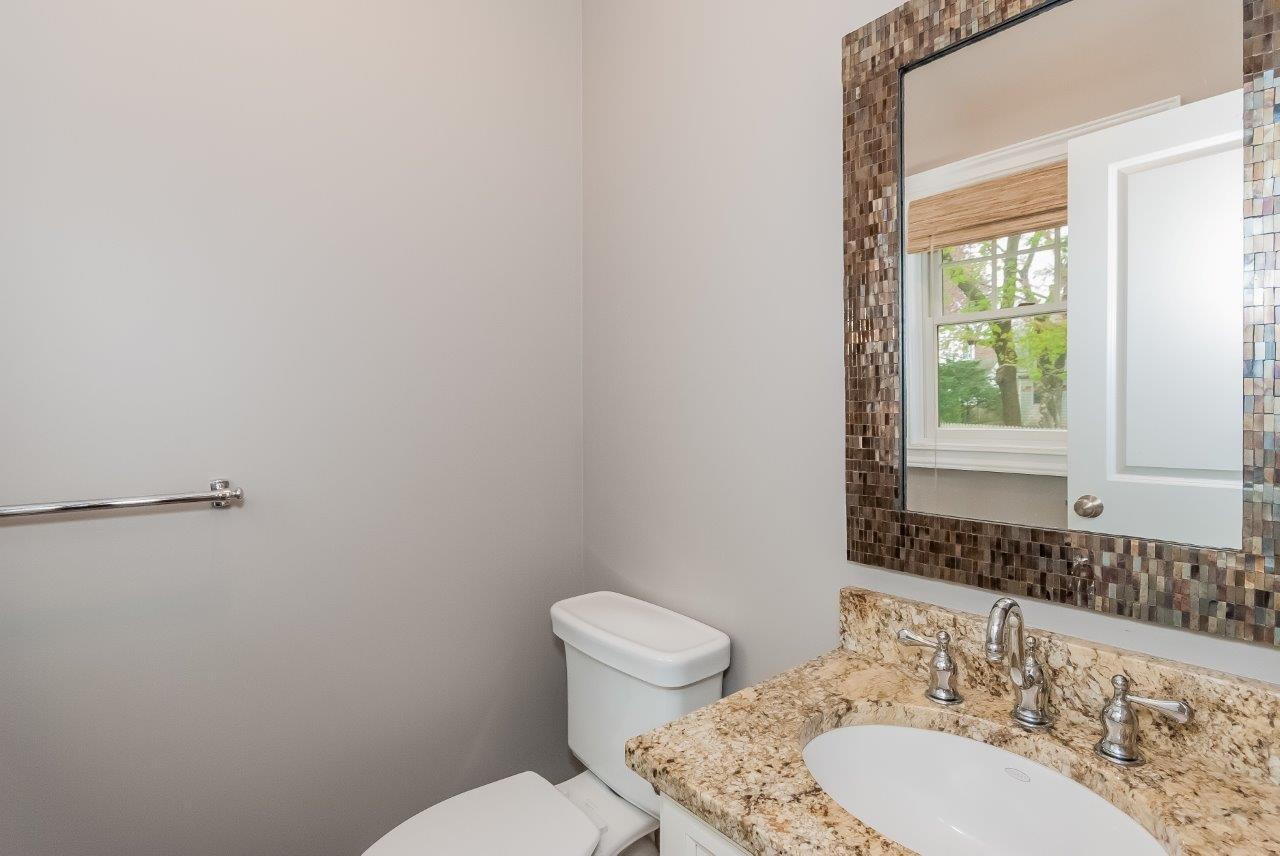 44 Gower Road New Canaan, CT 06840 - Photo 31 of 53 a bathroom with a toilet a sink and mirror